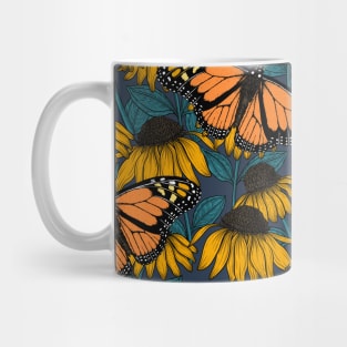 Monarch butterfly on yellow coneflowers Mug